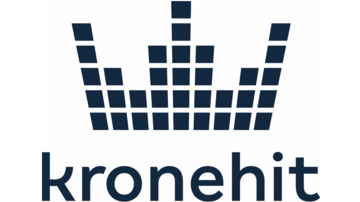 A modern logo featuring the lettering "kronehit" and a stylized crown motif. The colors are dark blue and black.
