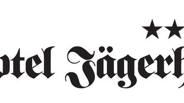 An elegant logo of the Hotel Jägerhof with four stars. The font is designed to be classical and appealing.